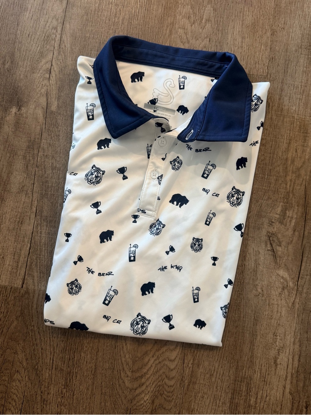 Swannies White Polo with Navy Collar and Navy Motif Print